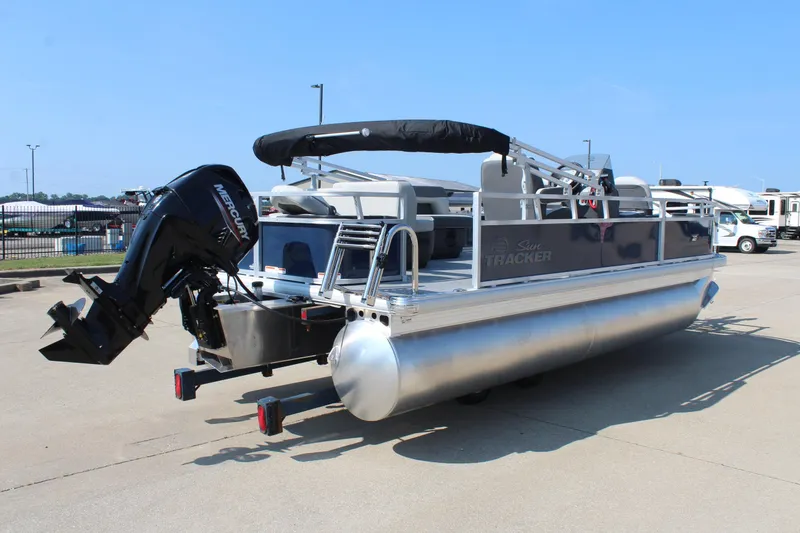 Slide: The Image of 2026 Sun Tracker Bass Buggy 18 DLX pontoon boat with Mercury outboard motor. - 5