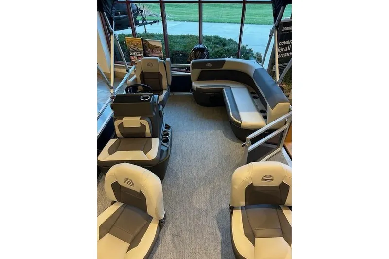 Slide: The Image of 2026 Sun Tracker Bass Buggy 16 XL Select interior with plush seating and modern design. - 71