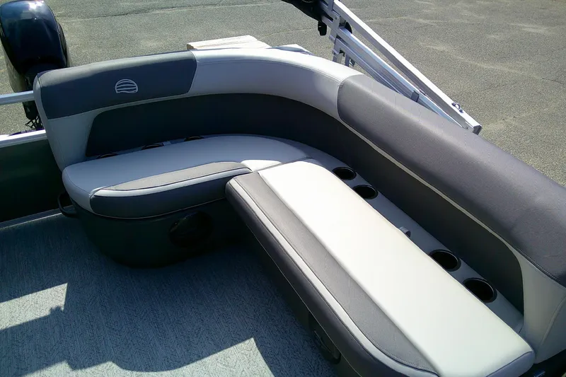Slide: The Image of 2026 Sun Tracker Bass Buggy 16 XL Select boat seating with cup holders. - 11