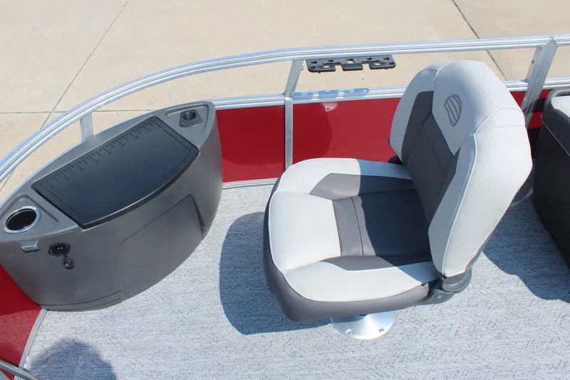 Slide: The Image of 2026 Sun Tracker Bass Buggy 18 DLX boat seat and console, featuring modern design and functionality. - 11