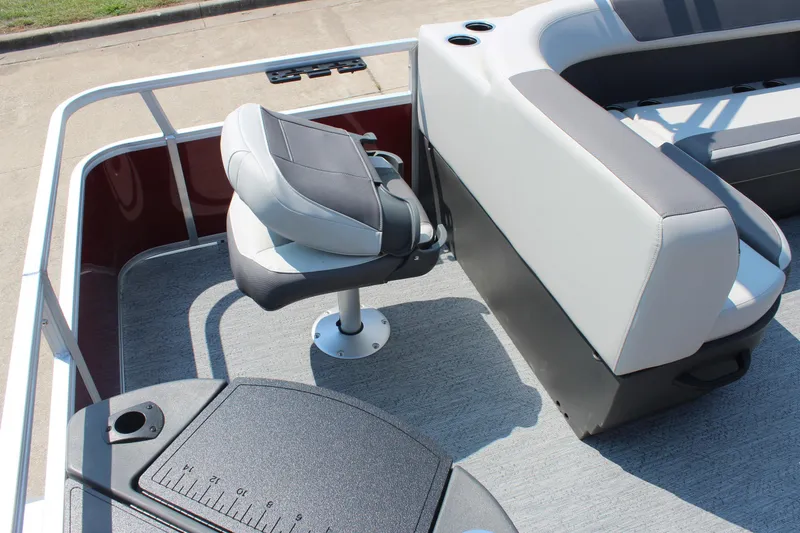 Slide: The Image of 2026 Sun Tracker Bass Buggy 18 DLX boat interior with seating and fishing platform. - 18