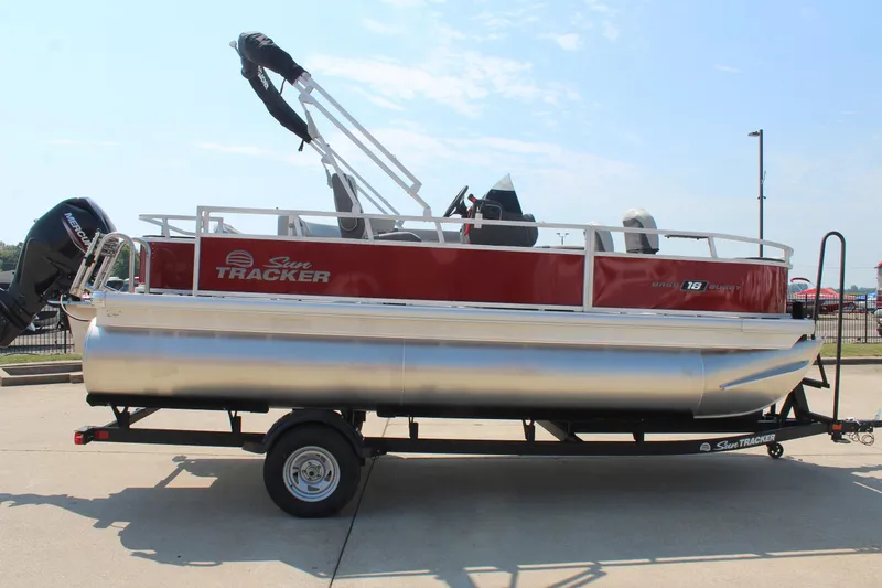 Slide: The Image of 2026 Sun Tracker Bass Buggy 18 DLX pontoon boat with Mercury outboard motor. - 4