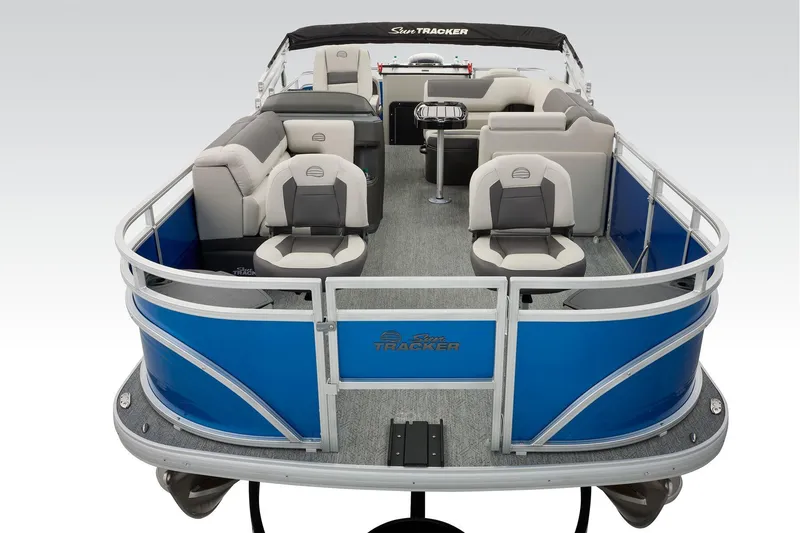 Slide: The Image of 2026 Sun Tracker Fishin' Barge 20 DLX interior with open storage compartments and seating. - 21