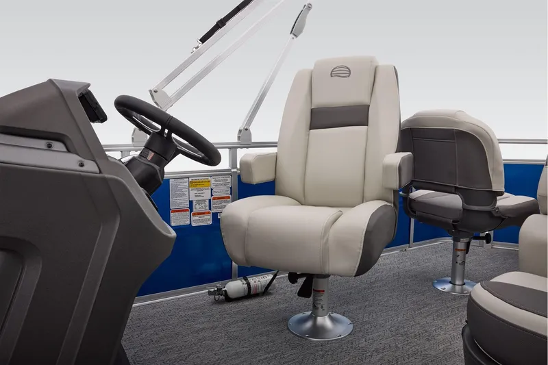 Slide: The Image of 2026 Sun Tracker Fishin' Barge 20 DLX interior with comfortable seating and fishing station. - 39