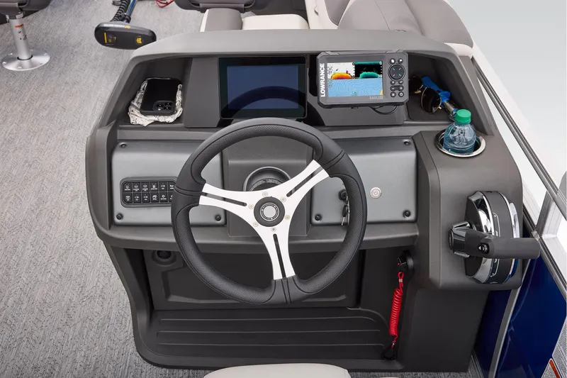 Slide: The Image of 2026 Sun Tracker Fishin' Barge 20 DLX fishing station with measuring board and cup holders. - 41