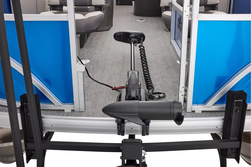 Slide: The Image of 2026 Sun Tracker Fishin' Barge 20 DLX interior with seating and fishing station. - 22