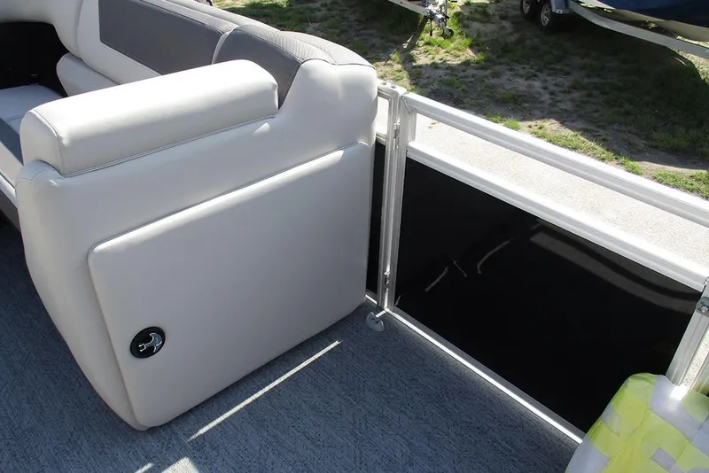 Slide: The Image of 2026 Sun Tracker Fishin' Barge 20 DLX interior seating and railing detail. - 20