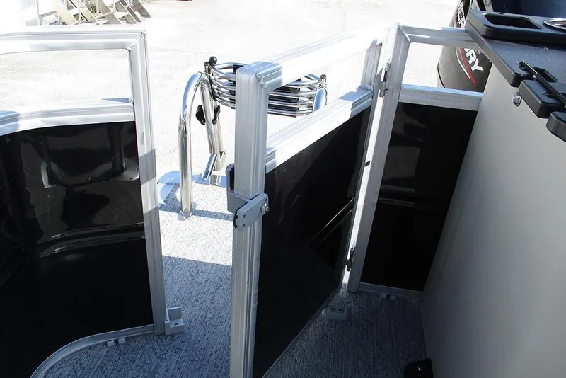 Slide: The Image of 2026 Sun Tracker Fishin' Barge 20 DLX gate and ladder detail, showcasing entryway design. - 33