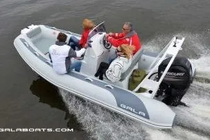 Slide: The Image of 2026 Gala A450HL boat with Tohatsu 60HP engine cruising on water. - 9