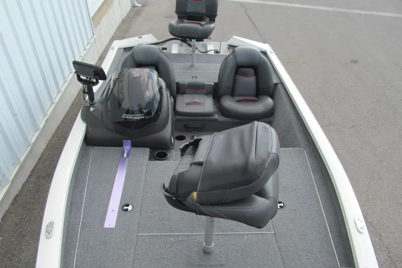Slide: The Image of 2023 Tracker Pro Team 175 TXW Tournament Edition boat interior with seating and console. - 10