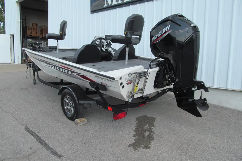 Slide: The Image of 2023 Tracker Pro Team 175 TXW Tournament Edition boat with Mercury engine, parked outdoors. - 3