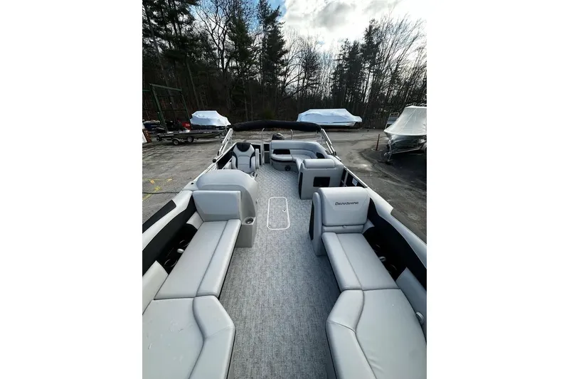 Slide: The Image of 2025 Berkshire 22CL2 LE pontoon boat with spacious seating and modern design. - 2