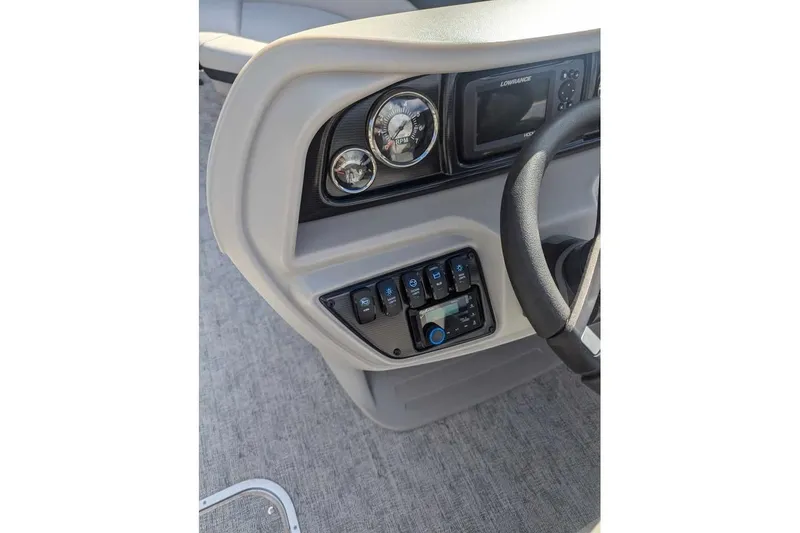 Slide: The Image of 2025 Berkshire 22UL LE dashboard with steering wheel, gauges, and control panel. - 14