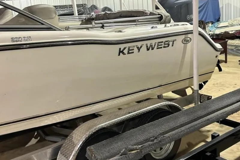 Slide: The Image of 2023 Key West 203 DFS boat on trailer in indoor storage. - 3