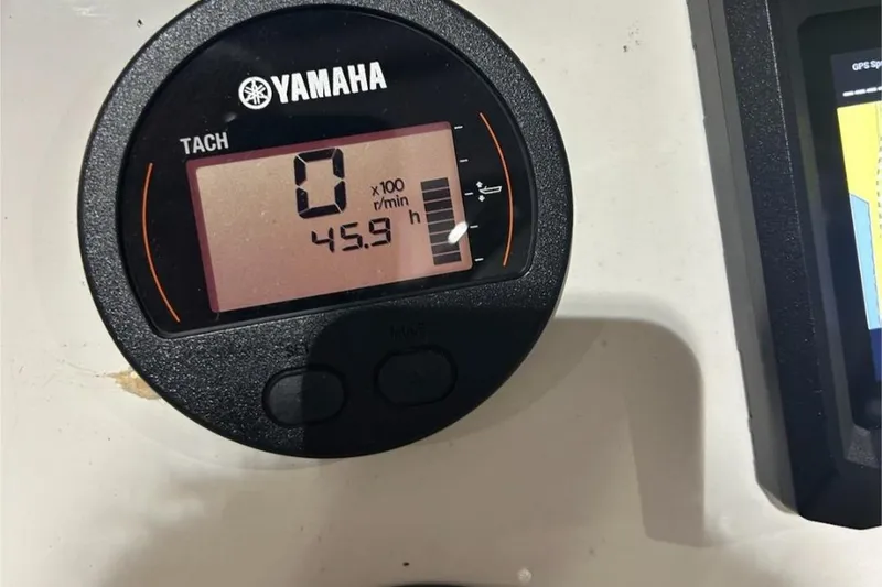 Slide: The Image of Yamaha tachometer displaying 45.9 hours on a 2023 Key West 203 DFS boat. - 9