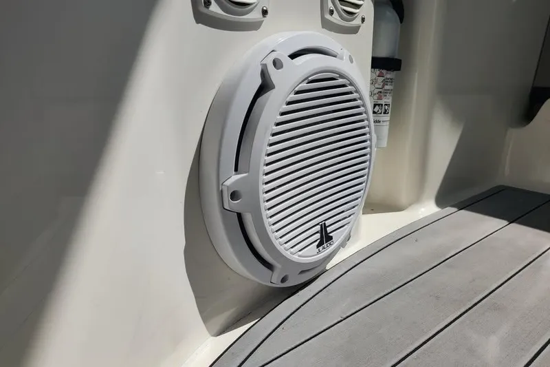 Slide: The Image of Close-up of a speaker on a 2002 Sea Ray 320 Sundancer boat deck. - 13