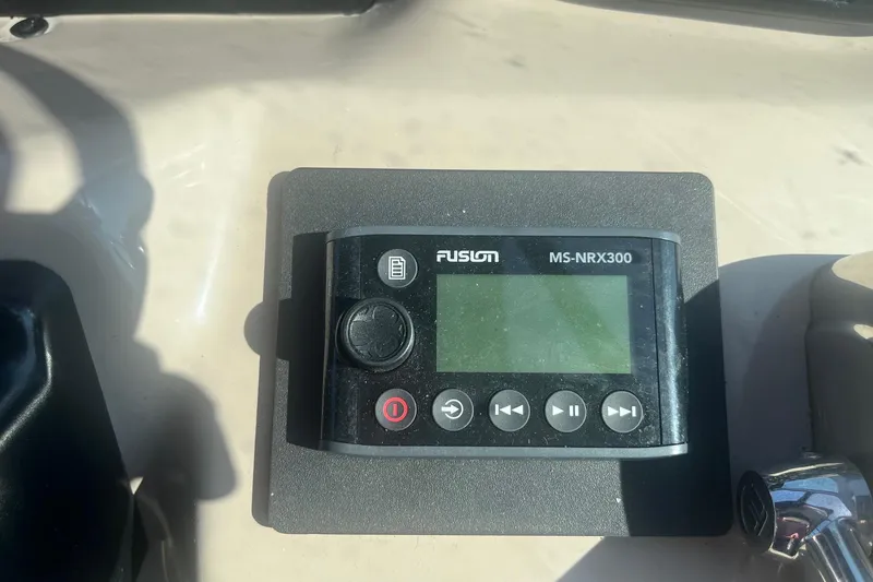 Slide: The Image of Fusion MS-NRX300 marine stereo on 2002 Sea Ray 320 Sundancer dashboard. - 17