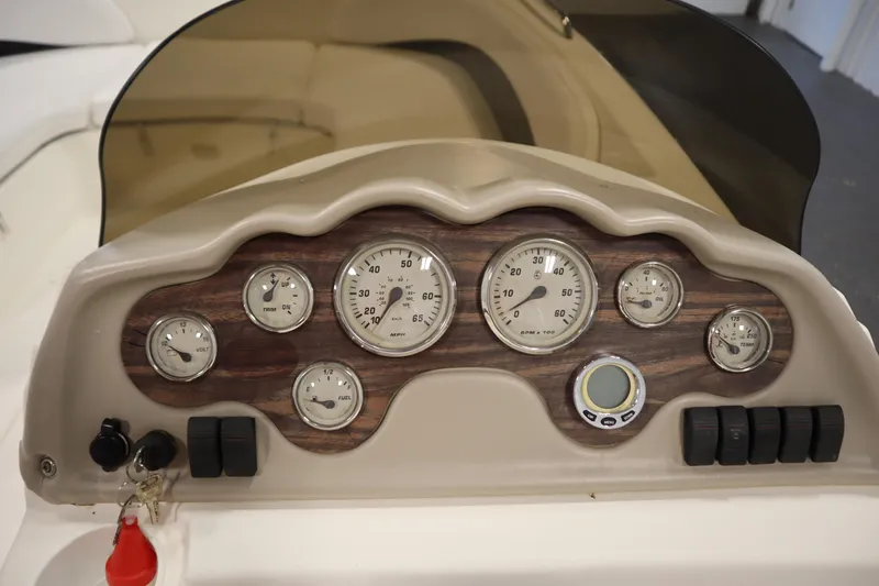 Slide: The Image of Dashboard of 2007 Glastron 205 DS boat with gauges and controls. - 22