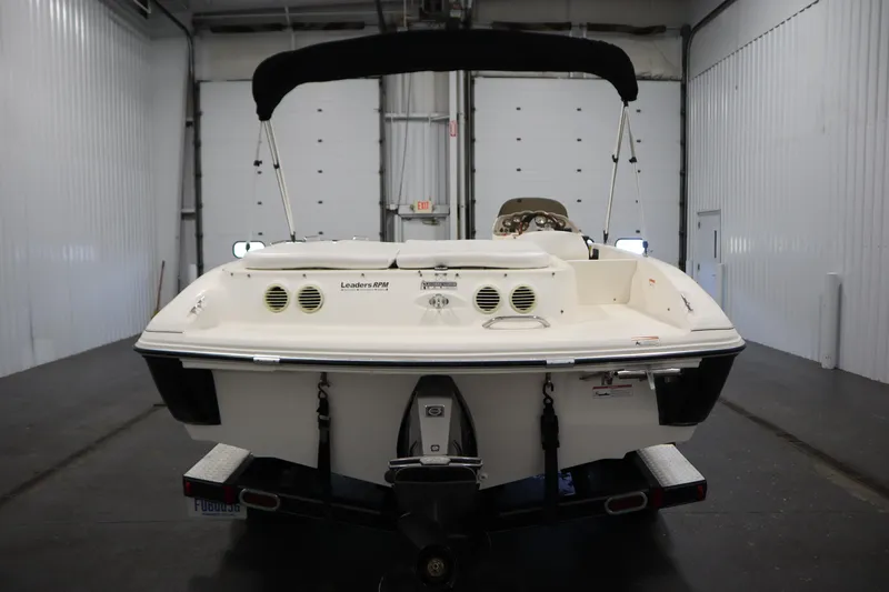 Slide: The Image of 2007 Glastron 205 DS boat in indoor storage, rear view. - 6