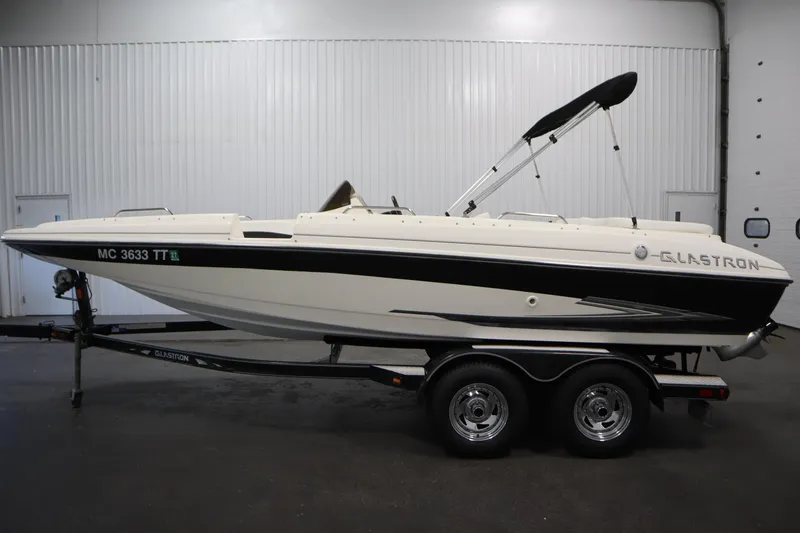 Slide: The Image of 2007 Glastron 205 DS boat on trailer in indoor setting. - 8
