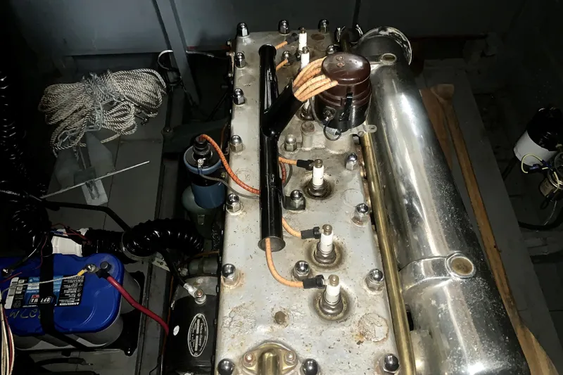 Slide: The Image of Engine of a 1927 Chris-Craft Lancer 22 boat, showcasing vintage mechanical components. - 3