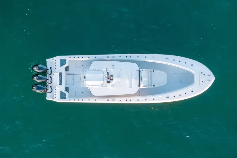 Slide: The Image of Aerial view of 2023 Front Runner 36 Center Console boat on blue water. - 5