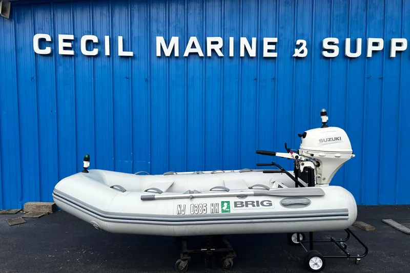Slide: The Image of 2019 Brig Falcon 300 inflatable boat with Suzuki motor at Cecil Marine. - 0
