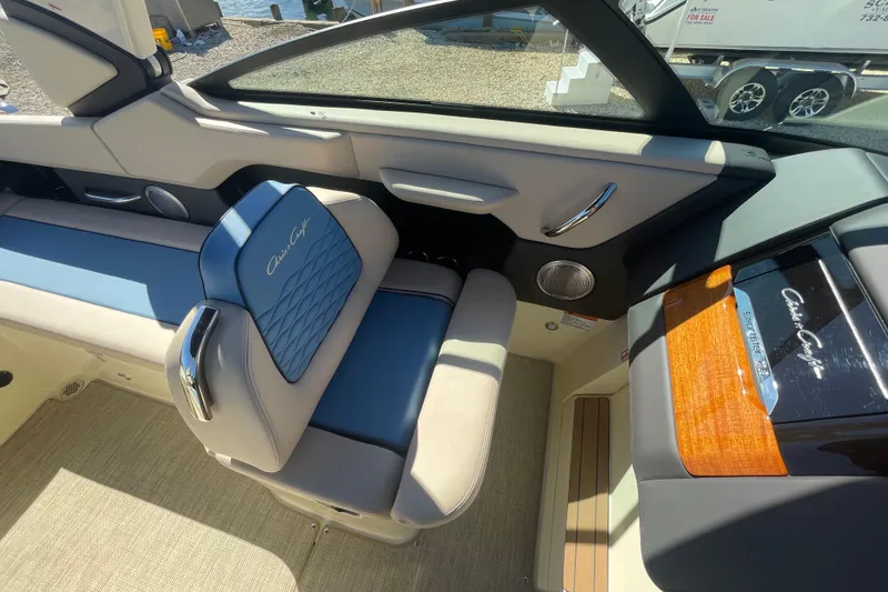 Slide: The Image of Dashboard of 2026 Chris-Craft Sportster 28 with dual Garmin displays. - 40