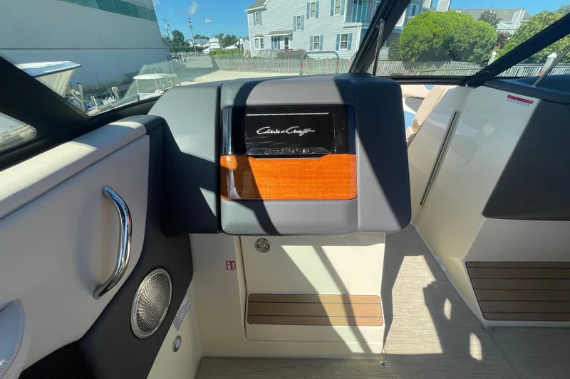 Slide: The Image of Interior of 2026 Chris-Craft Sportster 28, featuring luxurious seating and elegant dashboard design. - 42
