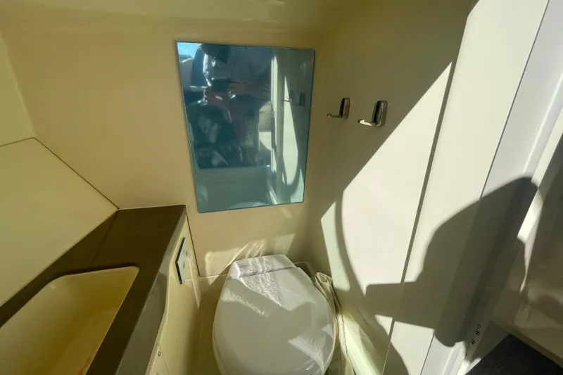 Slide: The Image of 2026 Chris-Craft Sportster 28 interior with sleek dashboard and modern design elements. - 46