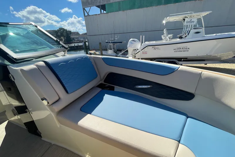 Slide: The Image of Interior of 2026 Chris-Craft Sportster 28, featuring ceiling speaker and mirror. - 49