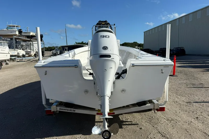 Slide: The Image of 2026 C-Hawk 190 Center Console SPL boat on trailer, rear view, outdoors. - 6