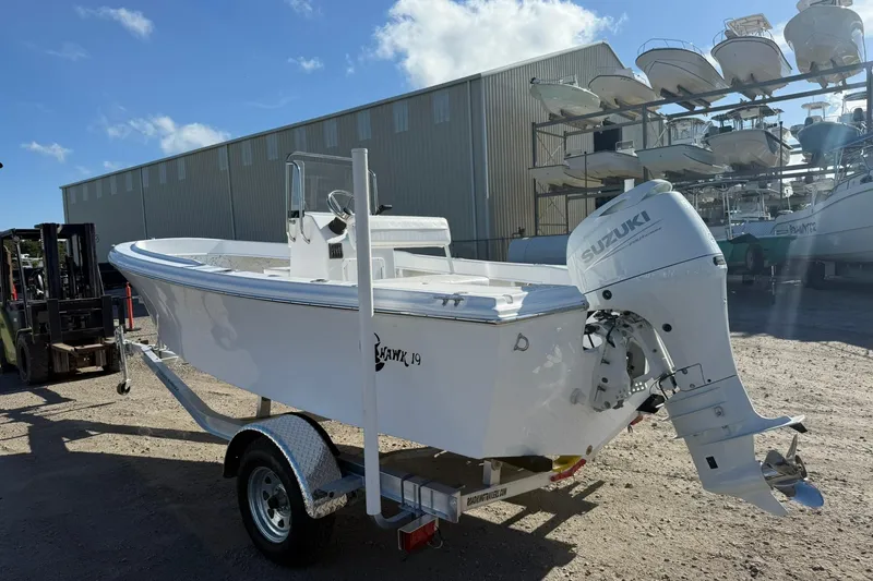 Slide: The Image of 2026 C-Hawk 190 Center Console SPL boat with Suzuki outboard motor on trailer. - 7