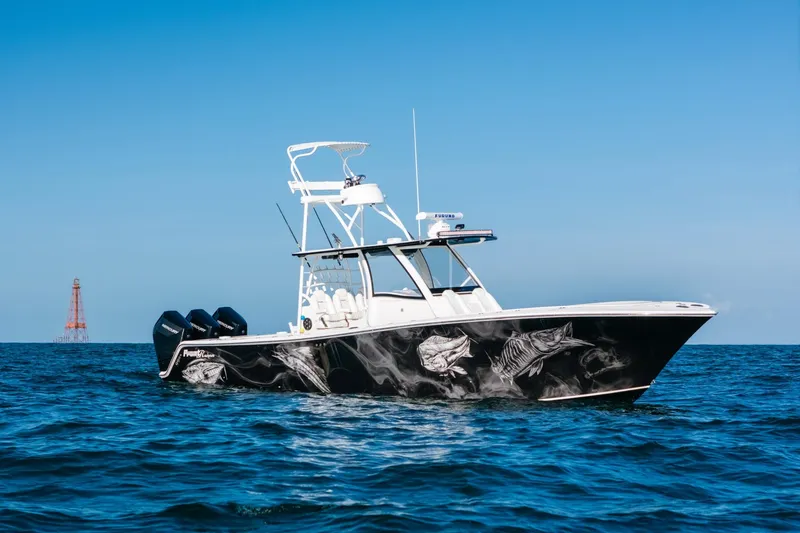 The Image of 2023 Front Runner 39 Center Console boat on open water, featuring striking marine graphics. - 0