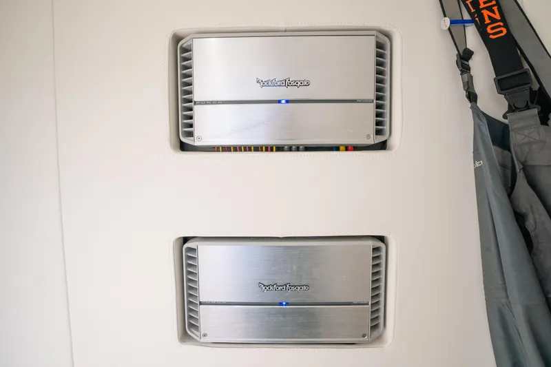 Slide: The Image of Rockford Fosgate amplifiers in 2023 Front Runner 39 Center Console boat interior. - 28