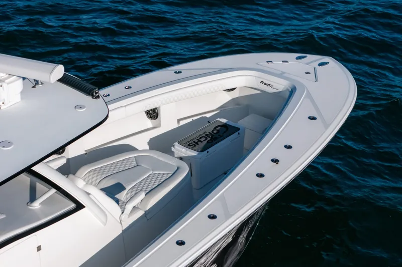 Slide: The Image of 2023 Front Runner 39 Center Console boat on water, showcasing sleek design and seating. - 5