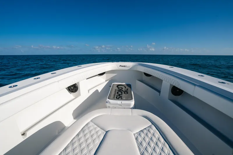Slide: The Image of 2023 Front Runner 39 Center Console boat on open ocean, clear blue sky. - 7