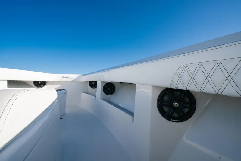 Slide: The Image of 2023 Front Runner 39 Center Console interior with sleek design and integrated speakers. - 8