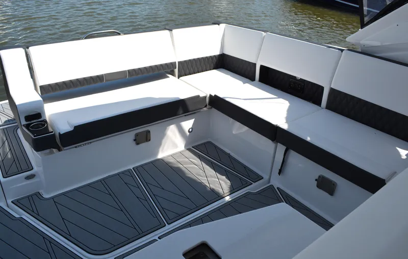 Slide: The Image of 2024 Monterey 378 Super Sport boat interior with white and black seating. - 25