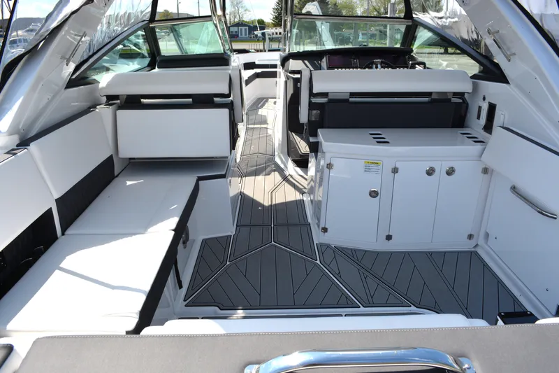 Slide: The Image of 2024 Monterey 378 Super Sport boat interior with modern seating and sleek design. - 6