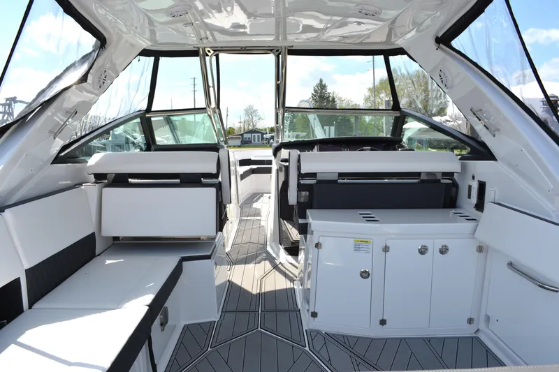 Slide: The Image of 2024 Monterey 378 Super Sport boat interior with sleek seating and modern design. - 7