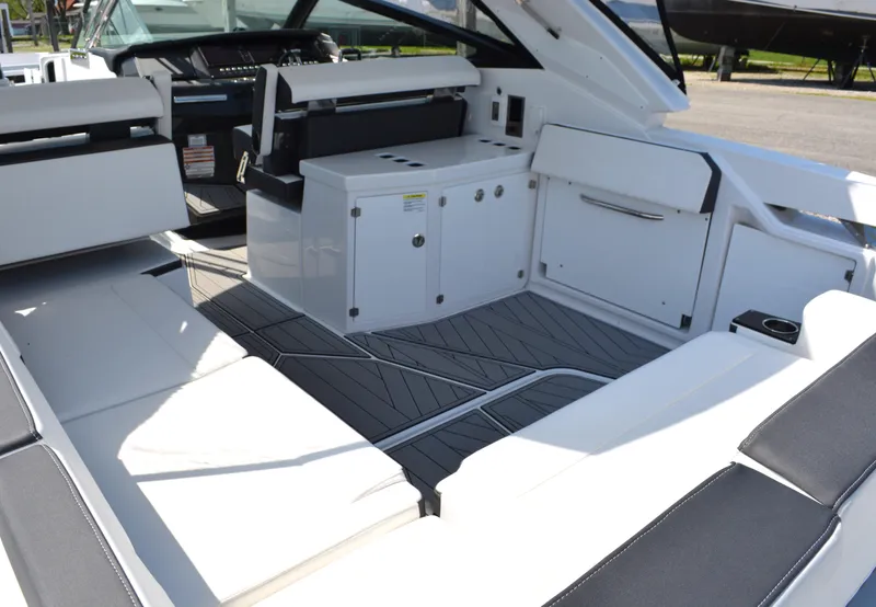 Slide: The Image of 2024 Monterey 378 Super Sport boat interior with seating and storage compartments. - 8