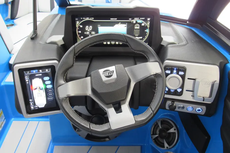 Slide: The Image of 2021 Malibu Wakesetter 21 MLX dashboard with modern controls and touchscreen displays. - 8