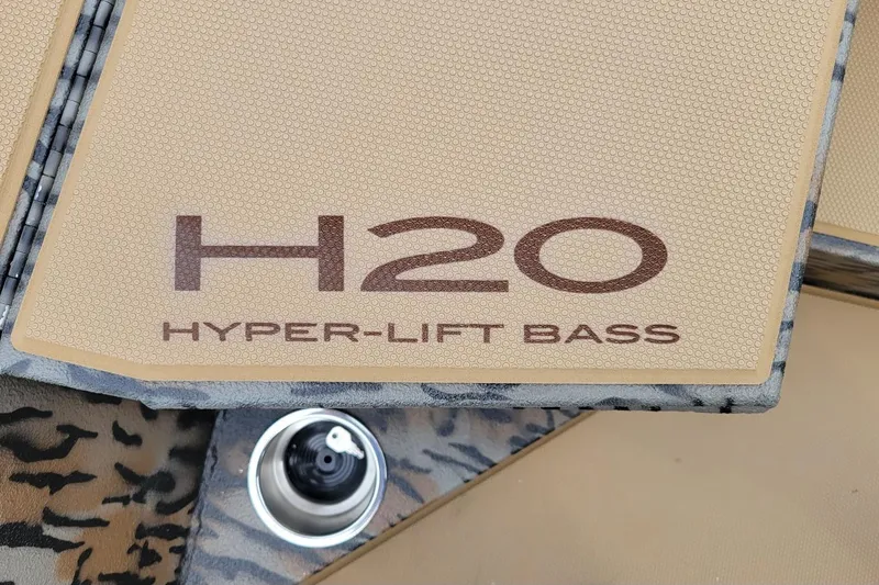 Slide: The Image of 2026 Xpress H20 Bass boat with Hyper-Lift Bass logo on deck. - 7