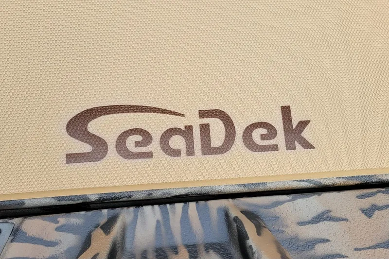 Slide: The Image of SeaDek logo on 2026 Xpress H20 Bass boat deck surface. - 8