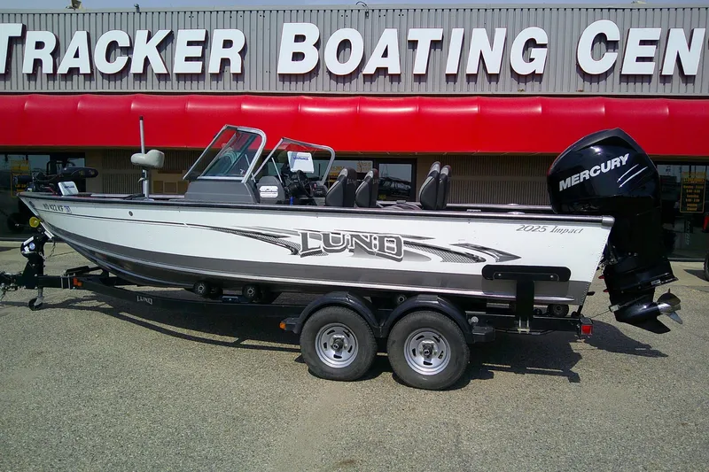 Slide: The Image of 2016 Lund 2025 Impact boat with Mercury engine at Tracker Boating Center. - 2