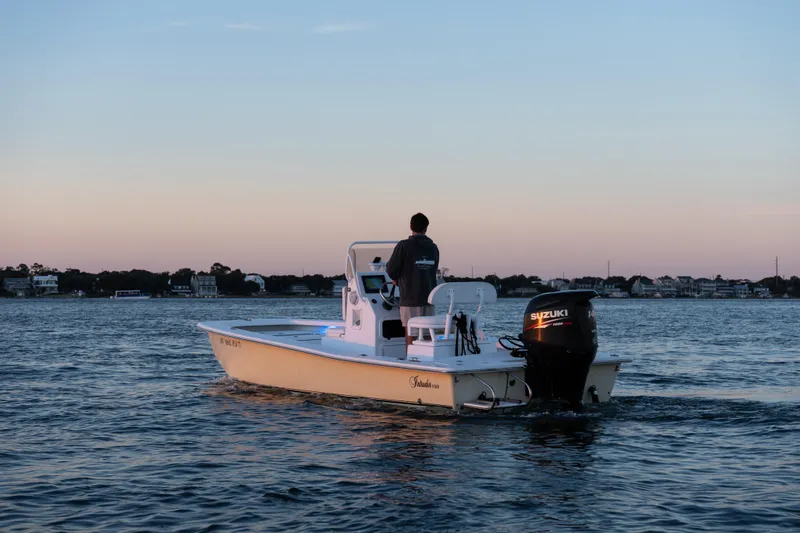Slide: The Image of Boat on water at sunset, Intruder 198 Tunnel Drive, 2016 model. - 4