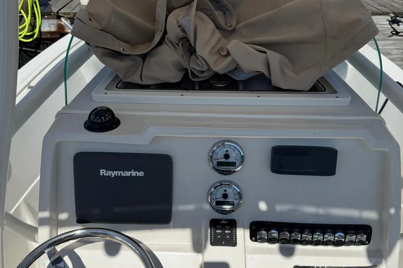 Slide: The Image of Control panel of a 2015 Sailfish 220 CC boat with Raymarine equipment. - 4