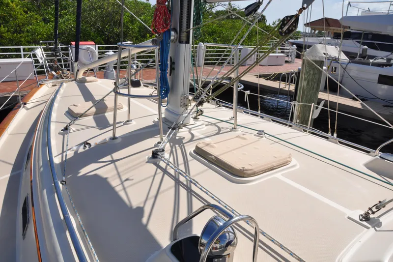 Slide: The Image of Deck view of 2002 Island Packet 420 sailboat docked at marina. - 14