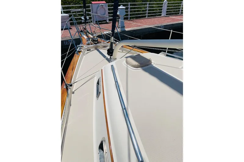 Slide: The Image of 2002 Island Packet 420 sailboat deck view at dock. - 15